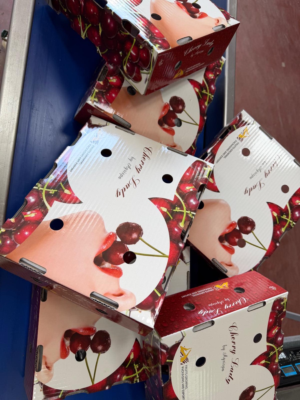 Stacked cherry export boxes ready for shipping